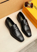 Louis Vuitton Black Metal-Accent Loafers — hero
