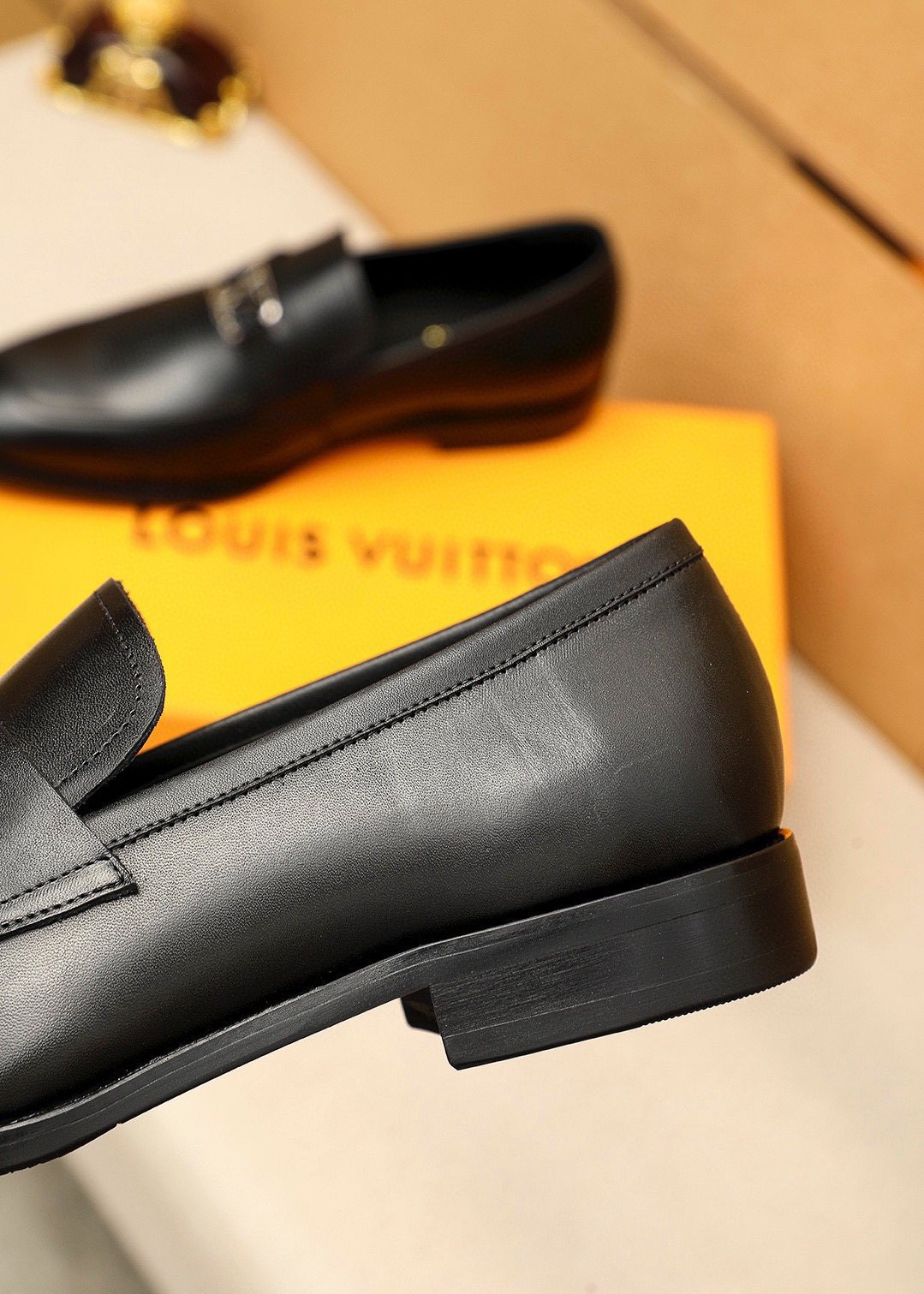 Louis Vuitton Black Metal-Accent Loafers — detail
