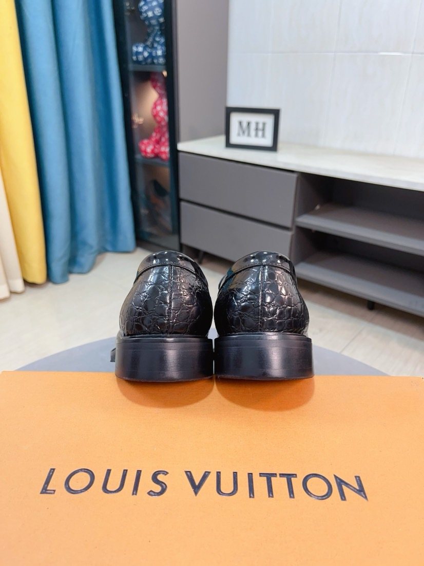 Louis Vuitton Black Embossed Loafers — front