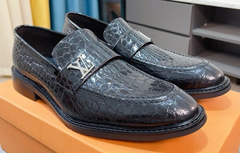 Louis Vuitton Black Embossed Loafers — hero