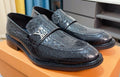 Louis Vuitton Black Embossed Loafers — hero