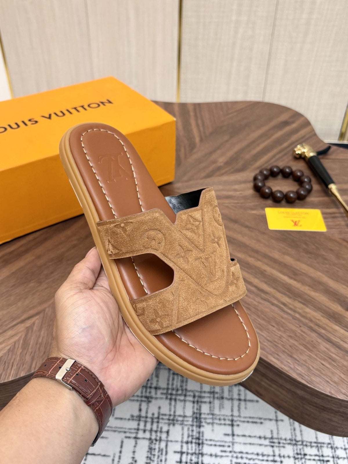 Louis Vuitton Tan Monogram Slide Sandals — model