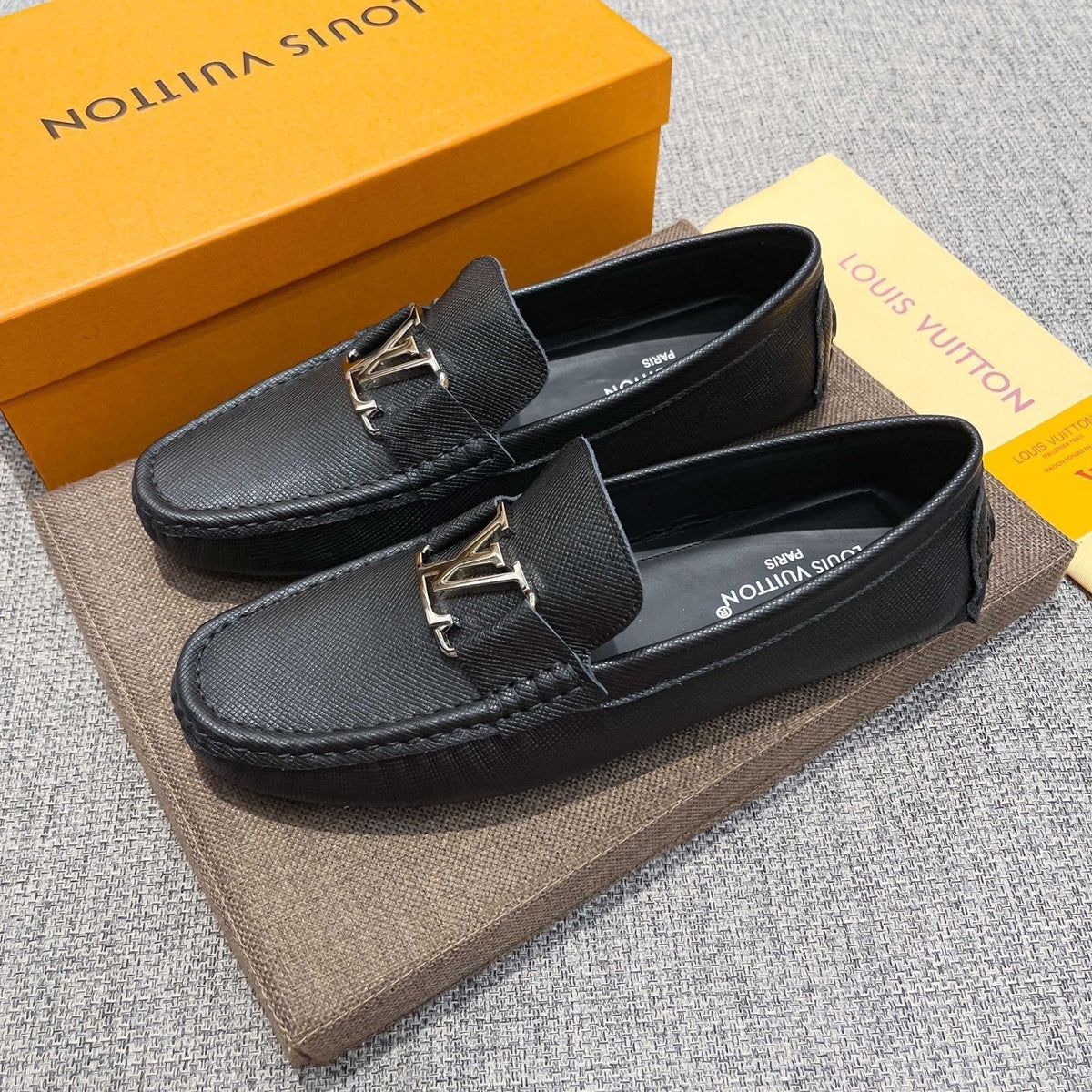 Louis Vuitton Black Metal-Hardware Loafers — front