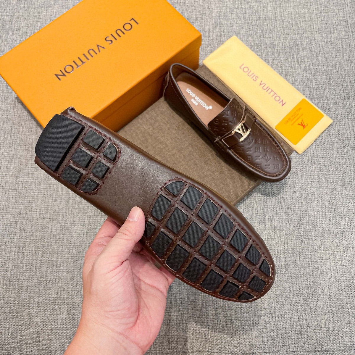 Louis Vuitton Brown Embossed Hardware Loafers — model