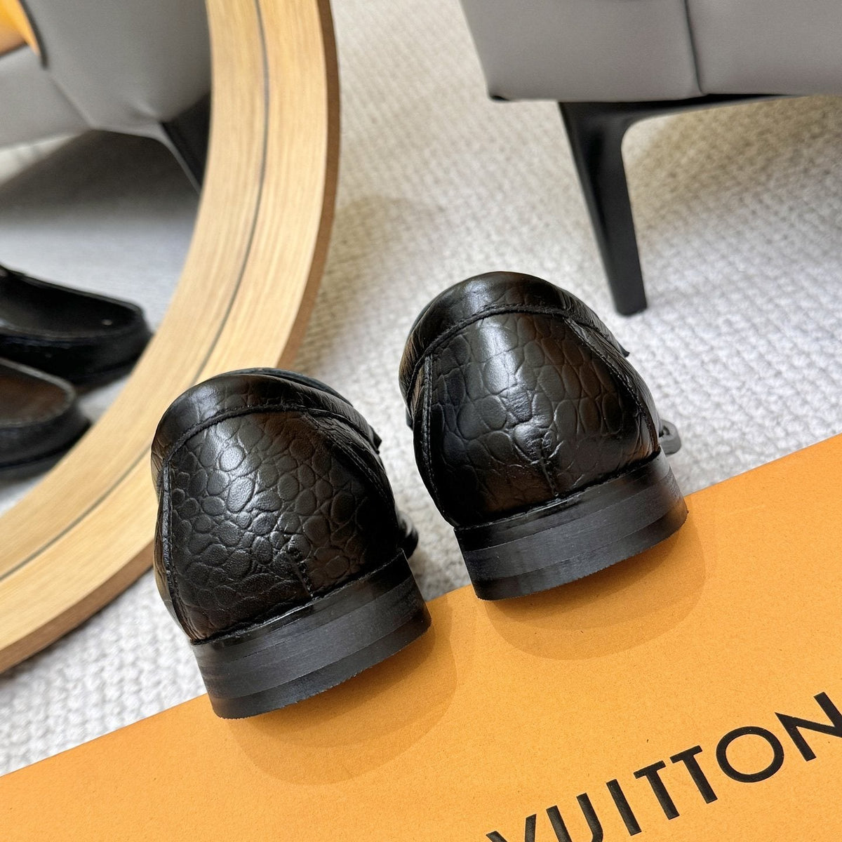 Louis Vuitton Black Embossed Leather Loafers — back