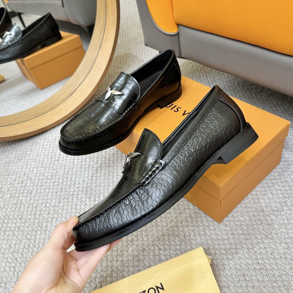 Louis Vuitton Black Embossed Leather Loafers — model