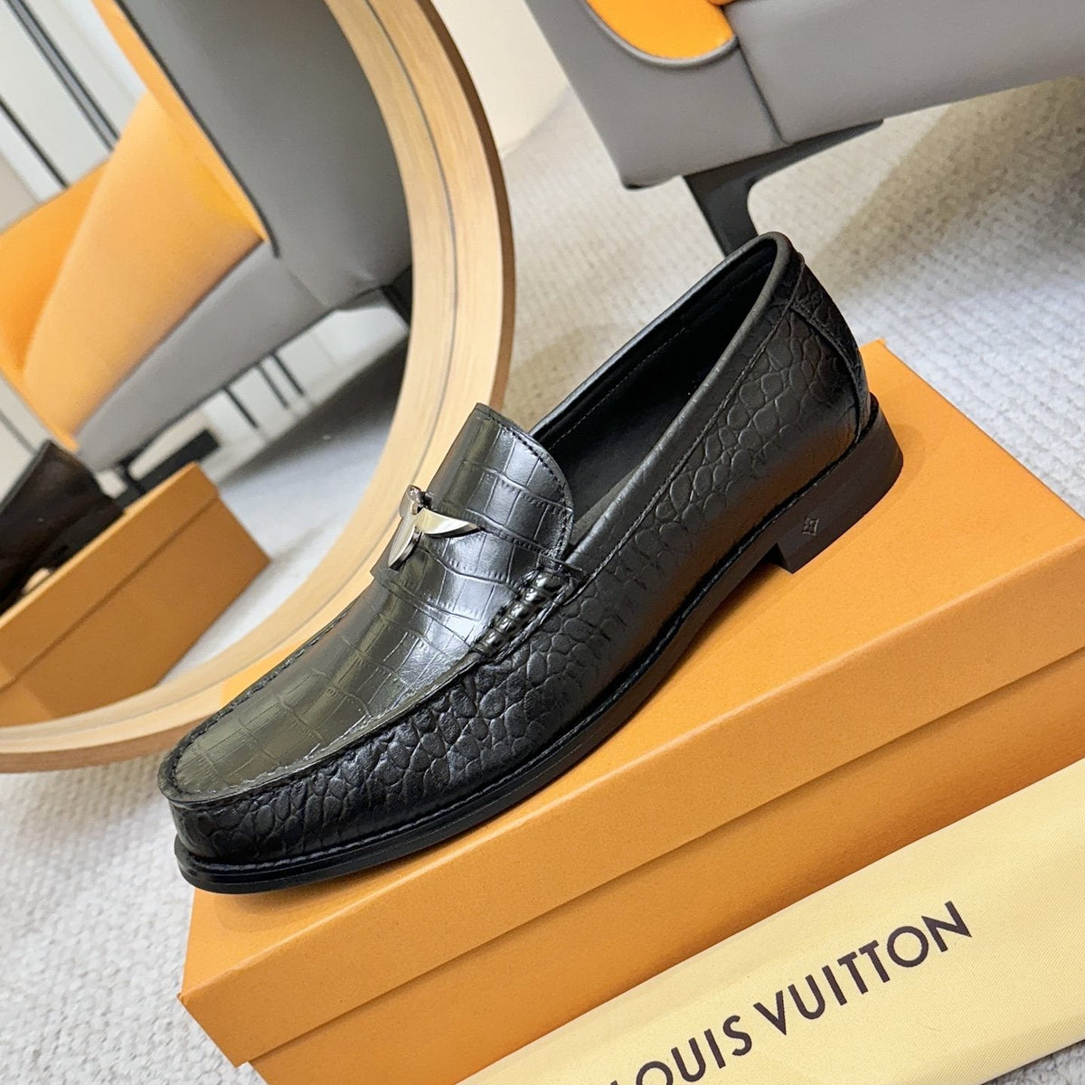 Louis Vuitton Black Embossed Leather Loafers — side