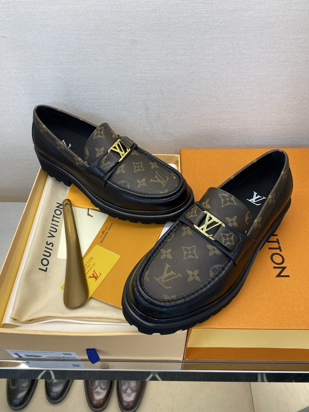 Louis Vuitton Brown Monogram Hardware Loafers — front