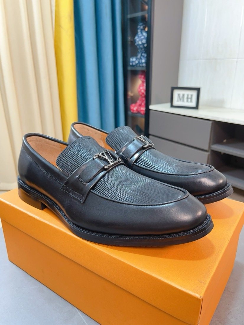 Louis Vuitton Black Textured Buckle Loafers — front