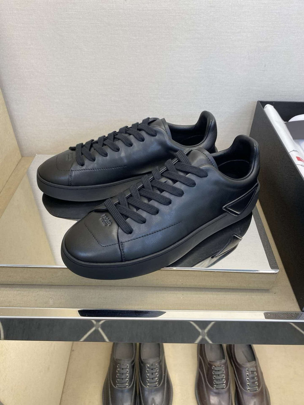 Prada Black Lace-Up Low-Top Sneakers — front