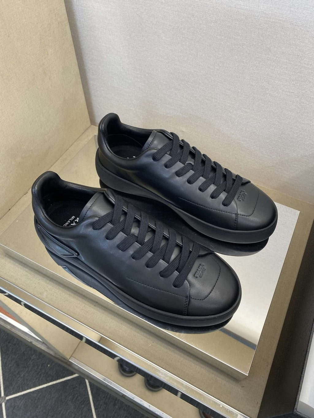 Prada Black Lace-Up Low-Top Sneakers — front