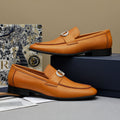 Dior Tan Leather Buckle Loafers — hero
