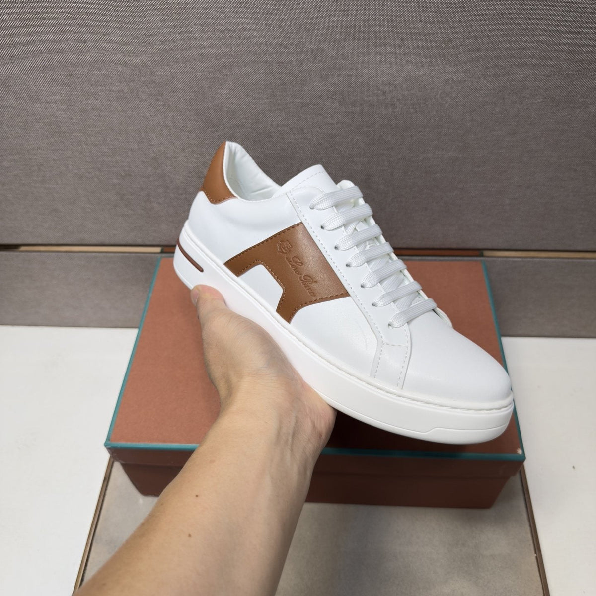White and Brown Low-Top Sneakers — model