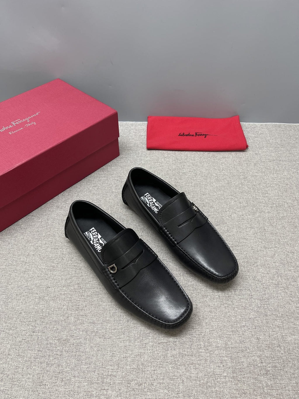 Ferragamo Black Buckle Loafers — hero
