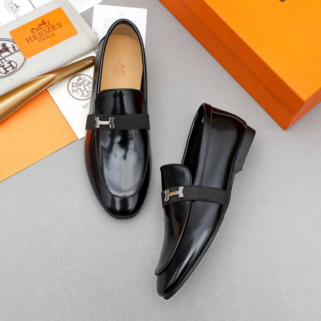 Hermès Black H-Hardware Loafers — front