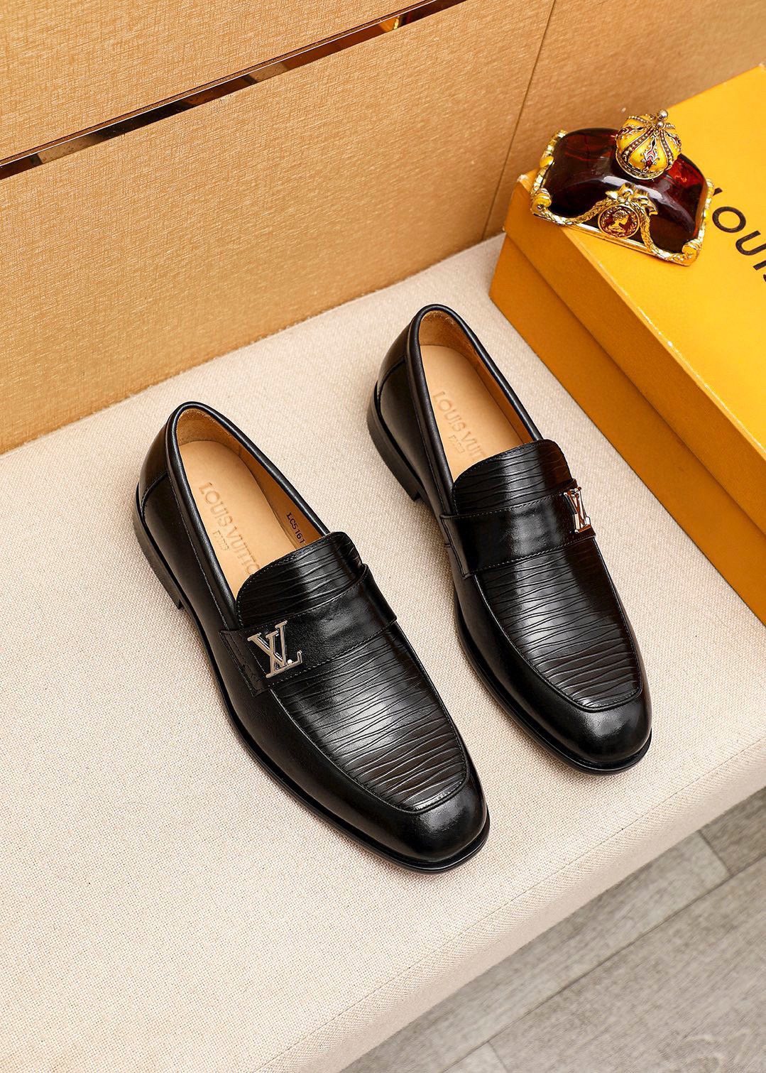 Louis Vuitton Black Textured Loafers — hero