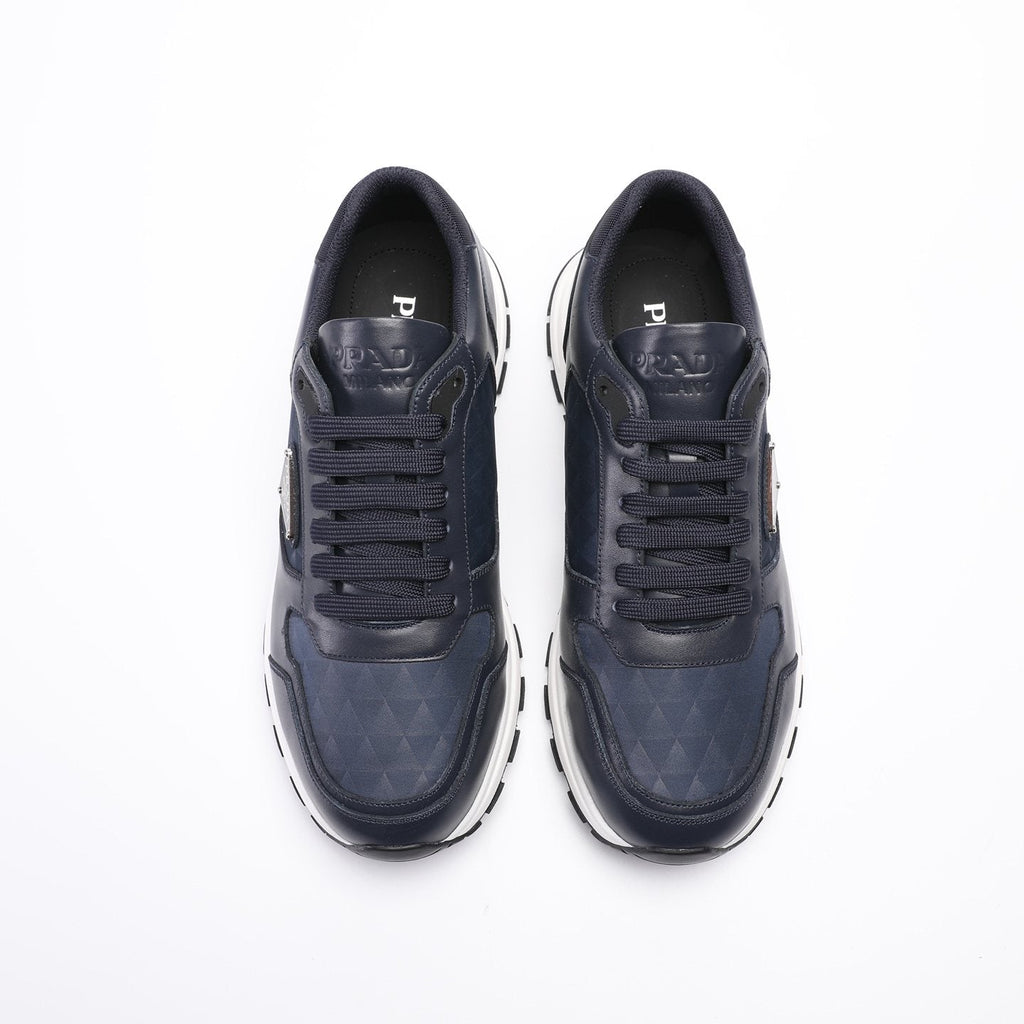 Prada Navy Textured Low-Top Sneakers — hero