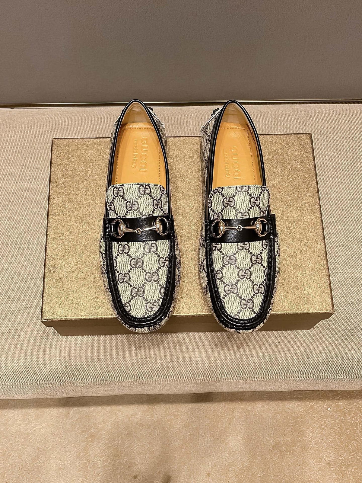 Gucci Beige and Black Gold-Hardware Loafers — hero