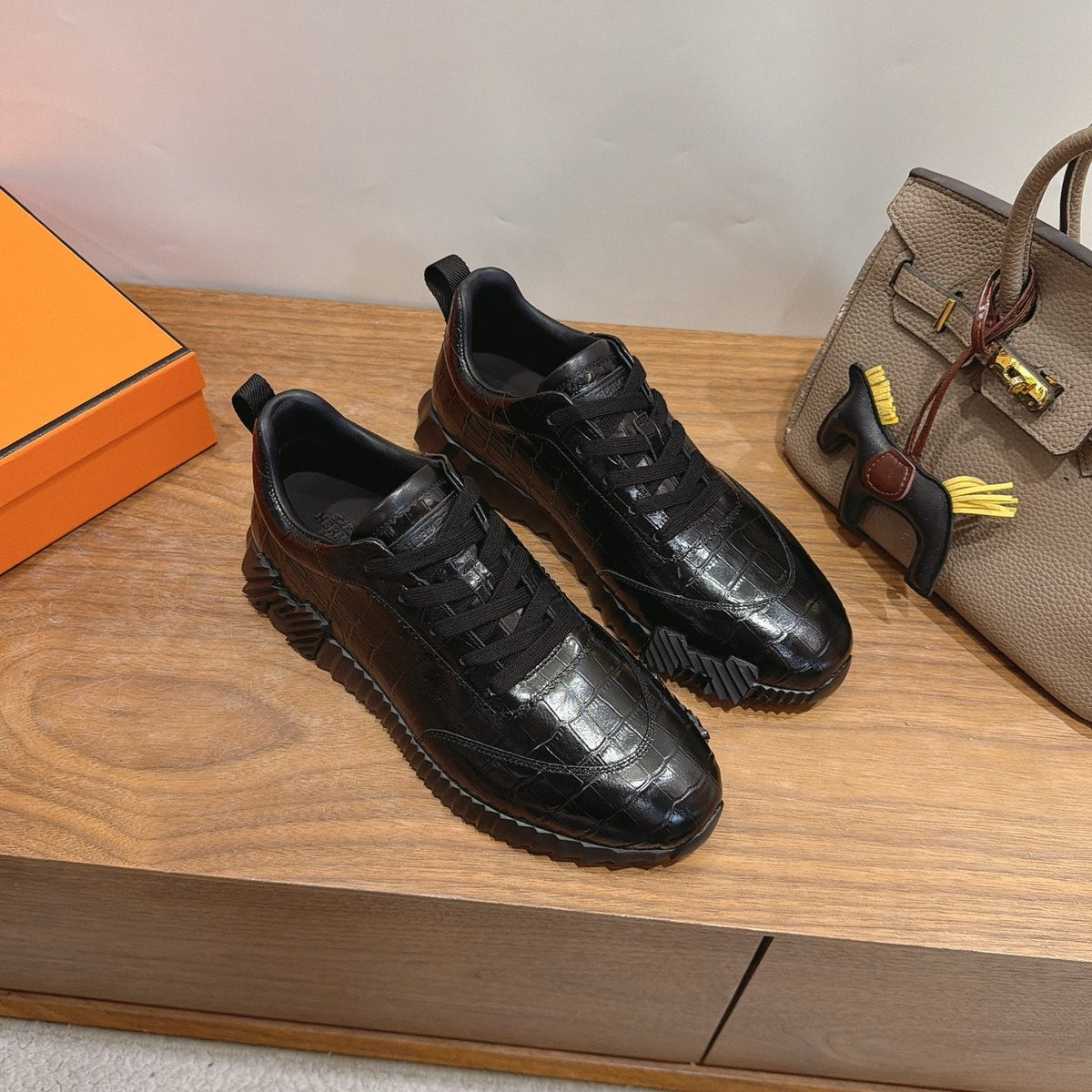 Hermès Black Textured Low-Top Sneakers — front
