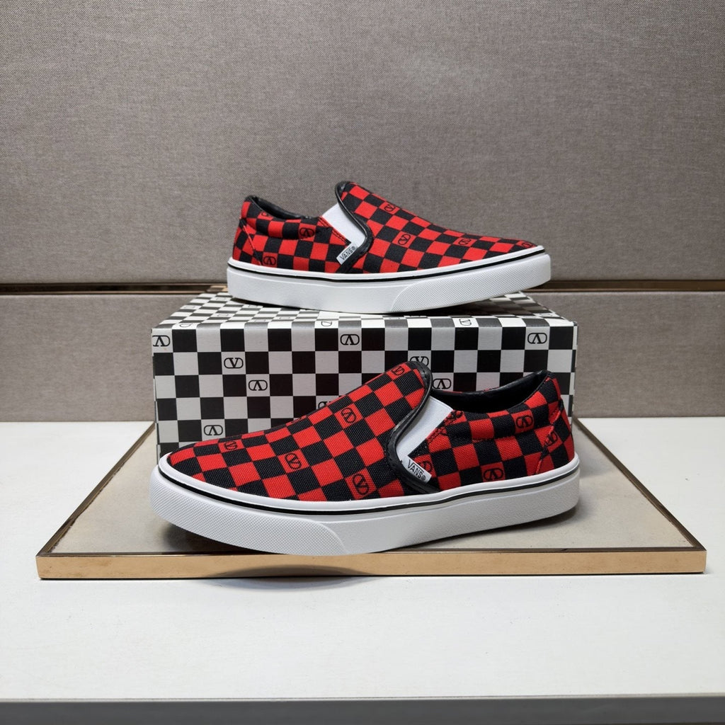 Vans Red and Black Checkerboard Slip-On Sneakers — front
