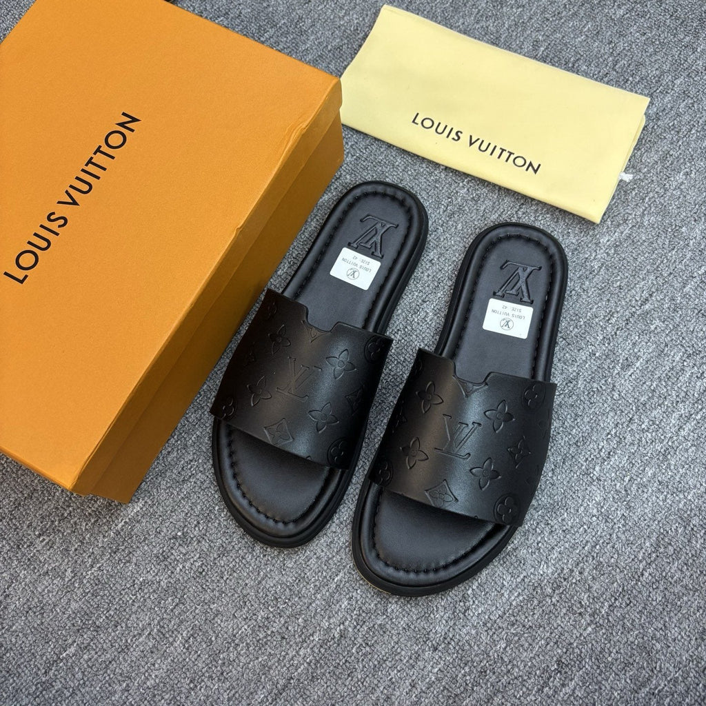 Louis Vuitton Black Embossed Slide Sandals — front