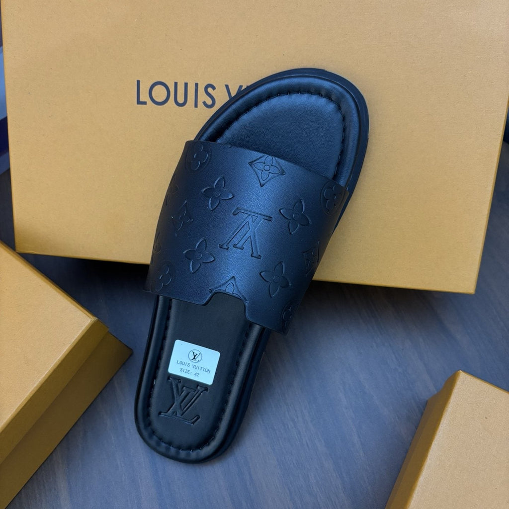 Louis Vuitton Black Embossed Slide Sandals — detail