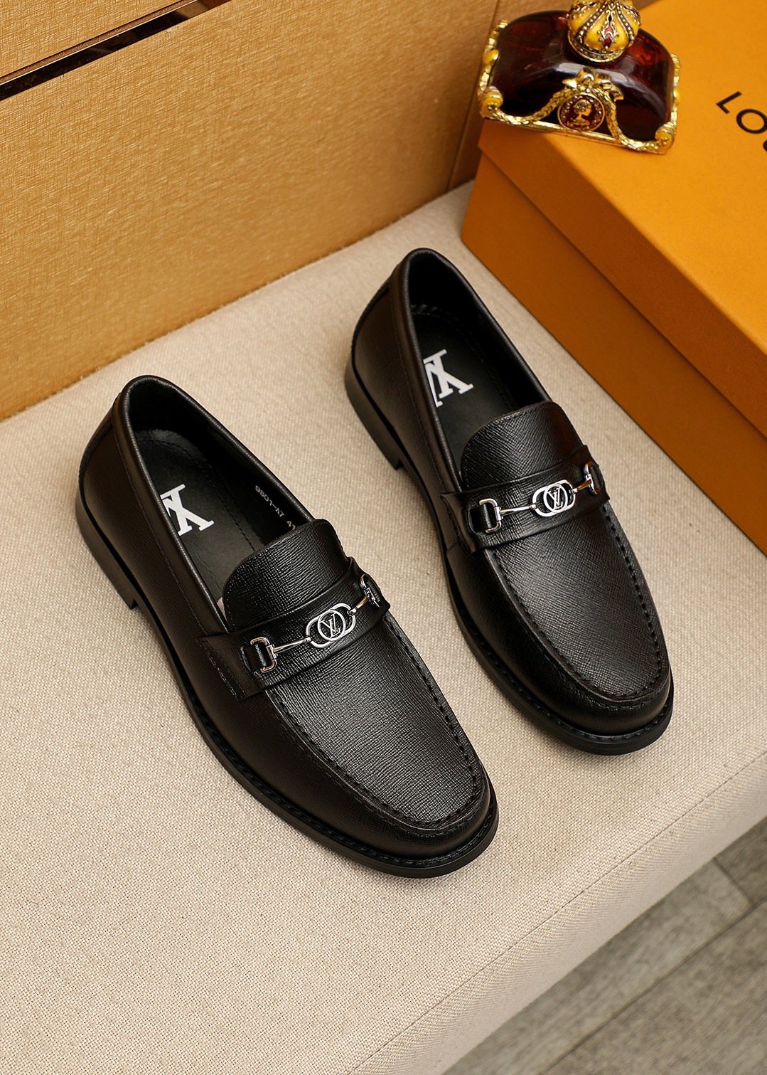 Louis Vuitton Black Textured Metal-Bit Loafers — front