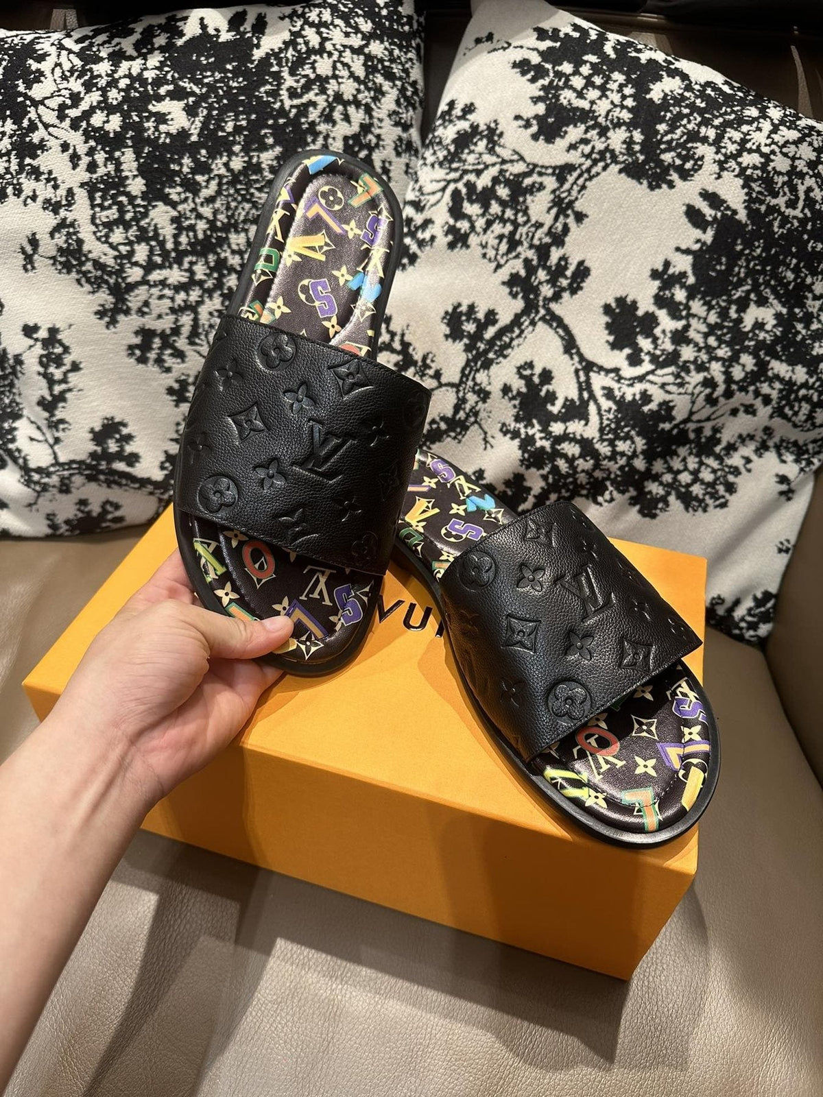 Louis Vuitton Black Embossed Slide Sandals — front