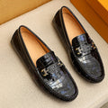 Louis Vuitton Black Embossed Loafers — hero