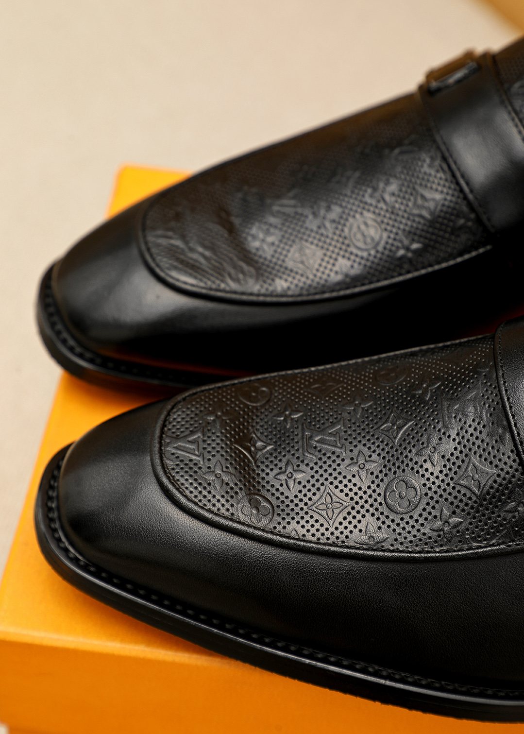 Louis Vuitton Black Embossed Loafers — detail