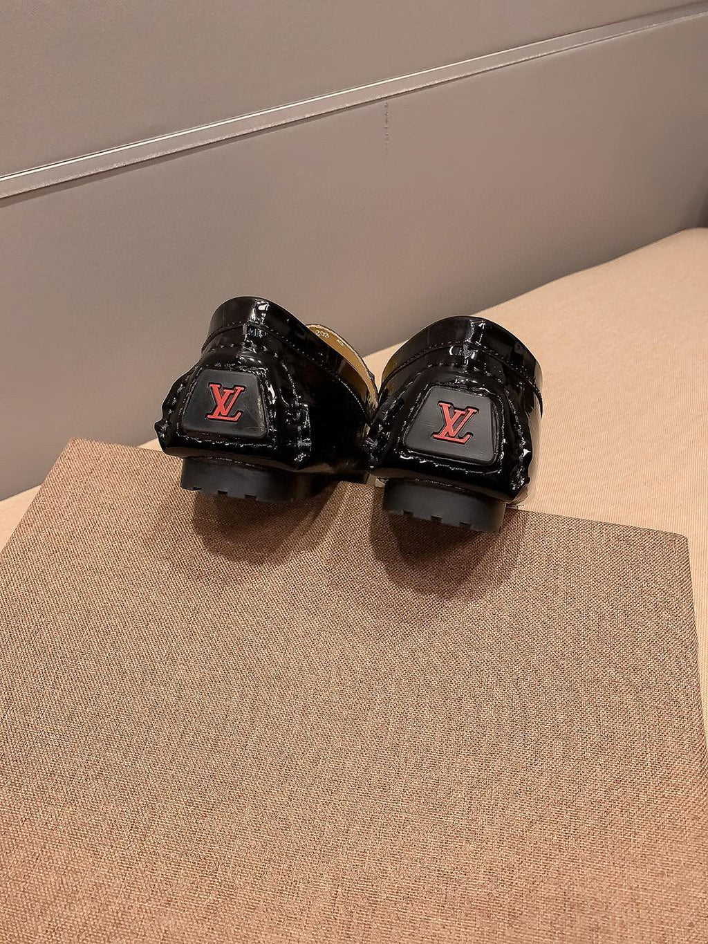Louis Vuitton Black Embossed Loafers — back