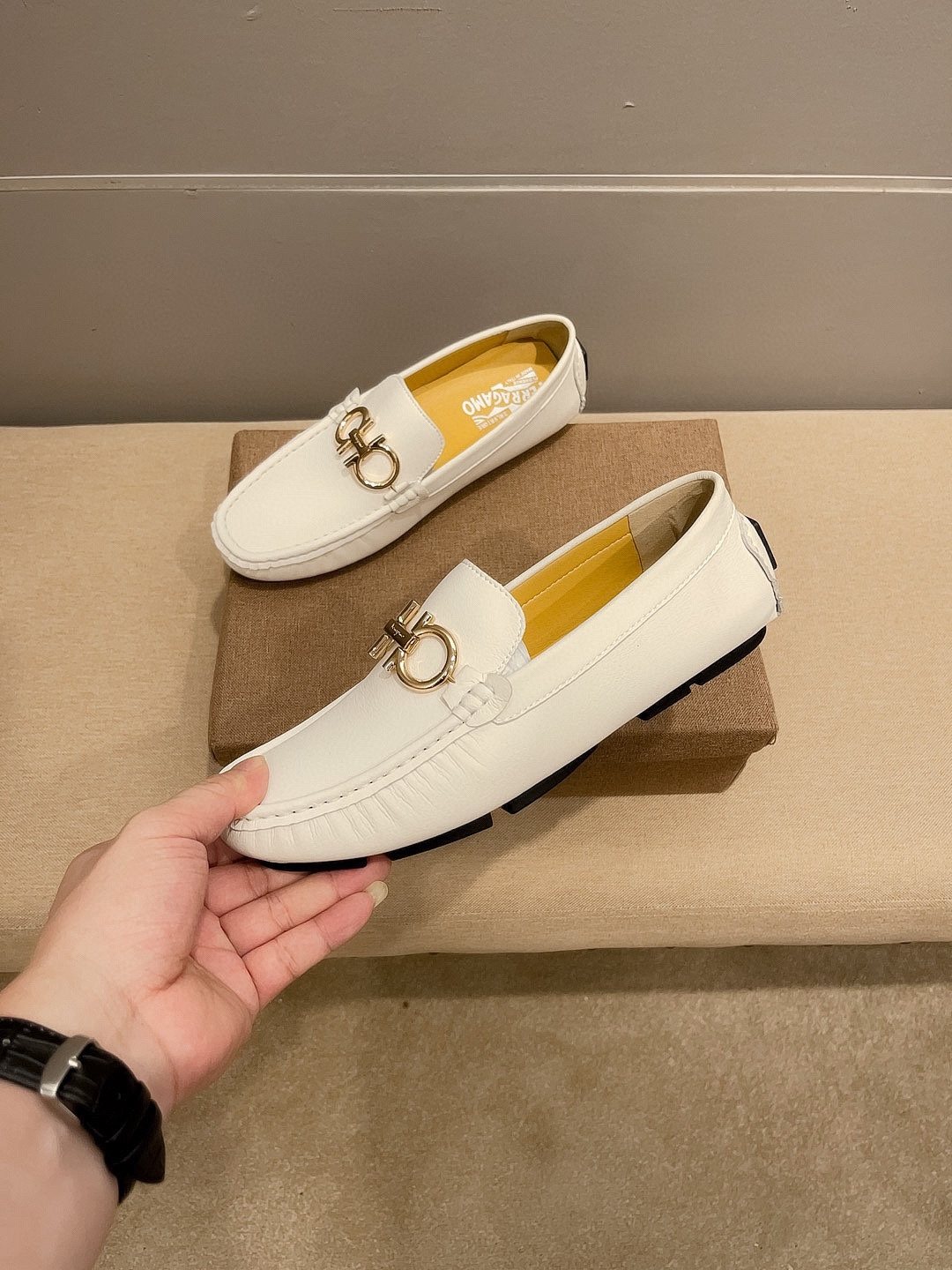 Ferragamo White Hardware Loafers — front