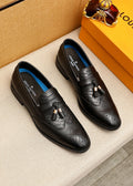 Louis Vuitton Black Textured Tassel Loafers — hero