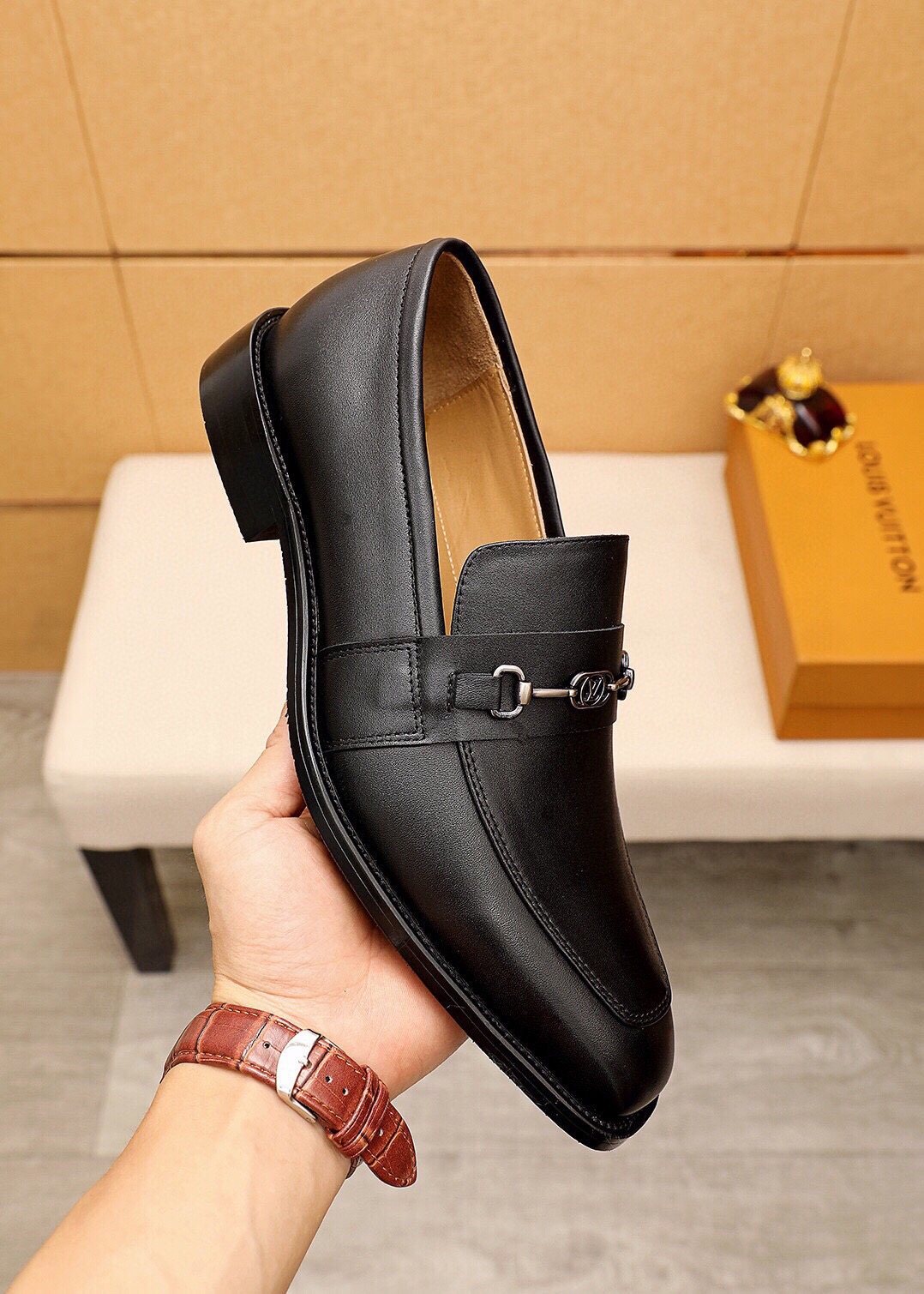 Louis Vuitton Black Metal-Bit Leather Loafers — model