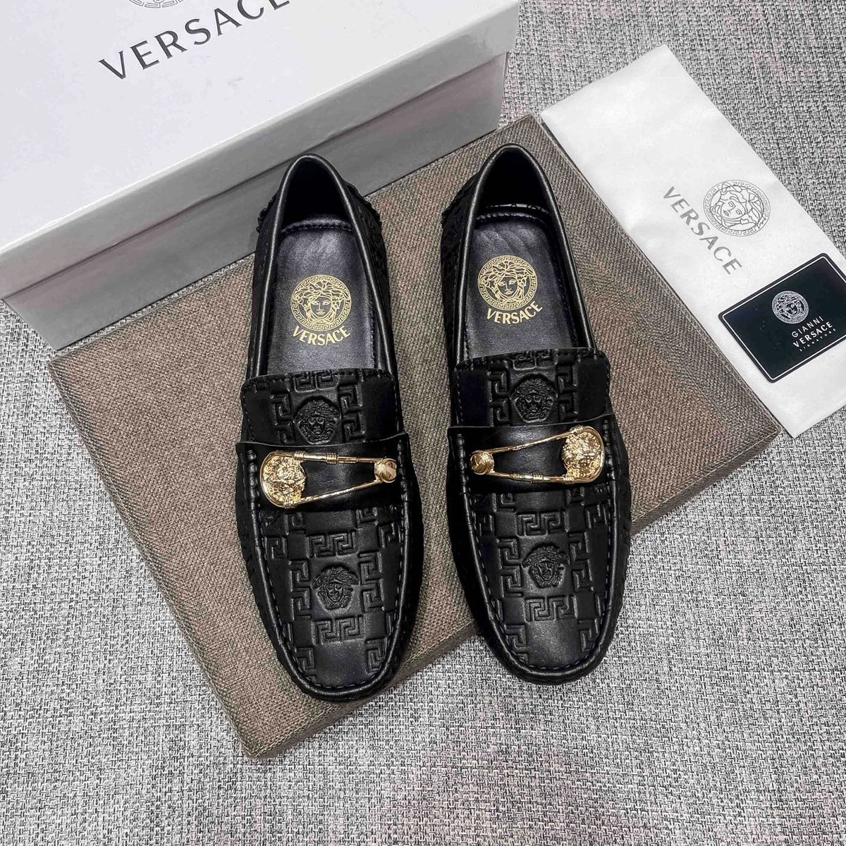 Versace Embossed Medallion Loafers — hero