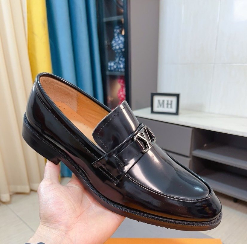 Louis Vuitton Black Buckle Loafers — front