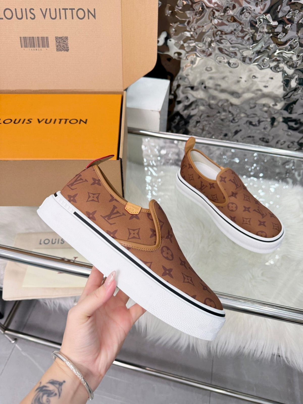 Louis Vuitton Brown Monogram Slip-On Sneakers — model