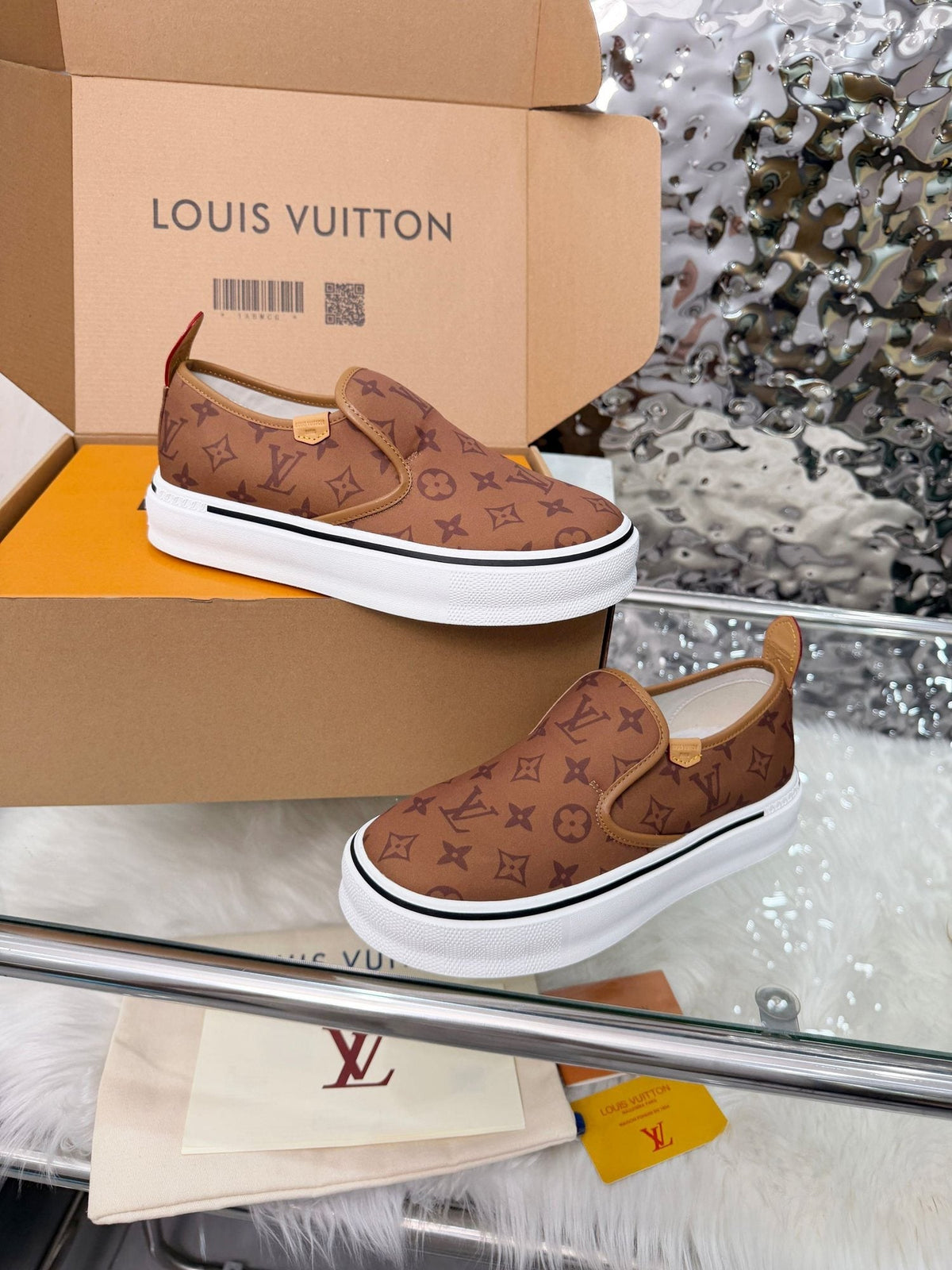 Louis Vuitton Brown Monogram Slip-On Sneakers — hero