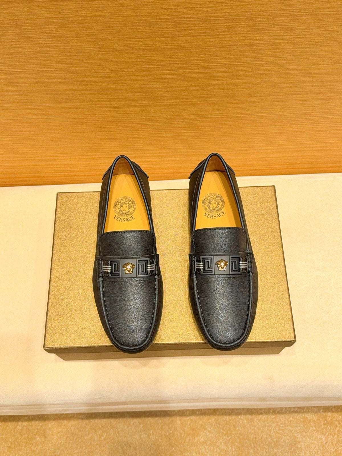Versace Black Textured Metal-Strap Loafers — hero