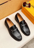 Louis Vuitton Black Leather Hardware Loafers — hero