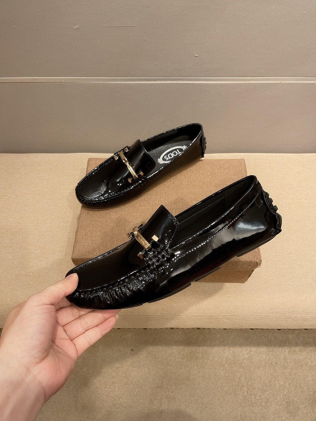 Tod's Glossy Metal Bar Loafers — side