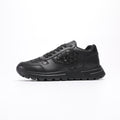 Prada Black Triangle-Plaque Sneakers — hero