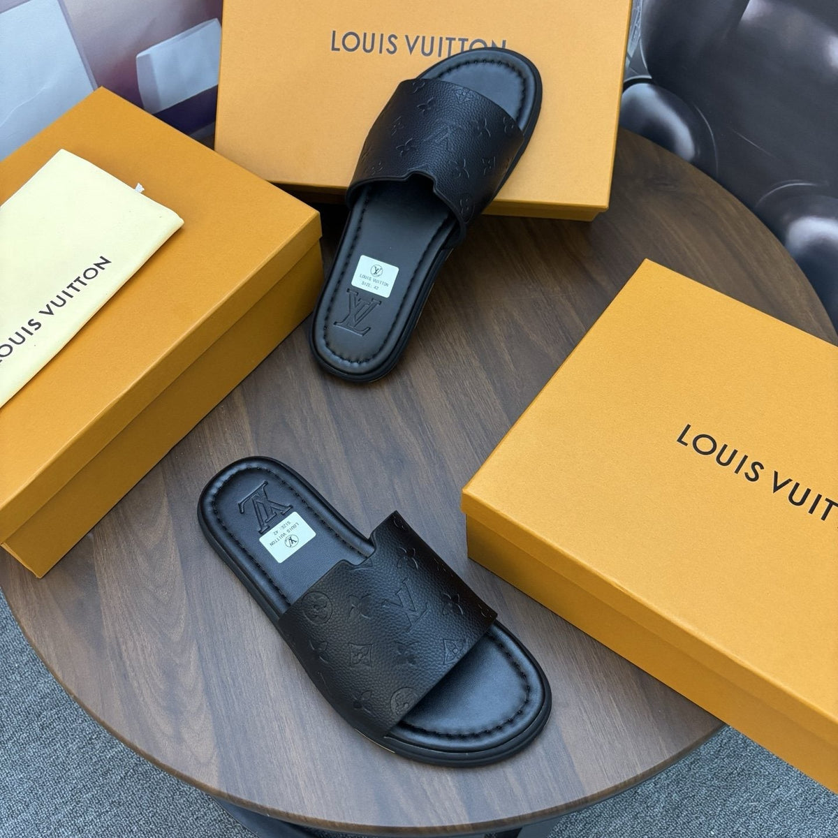 Louis Vuitton Black Embossed Strap Slide Sandals — front