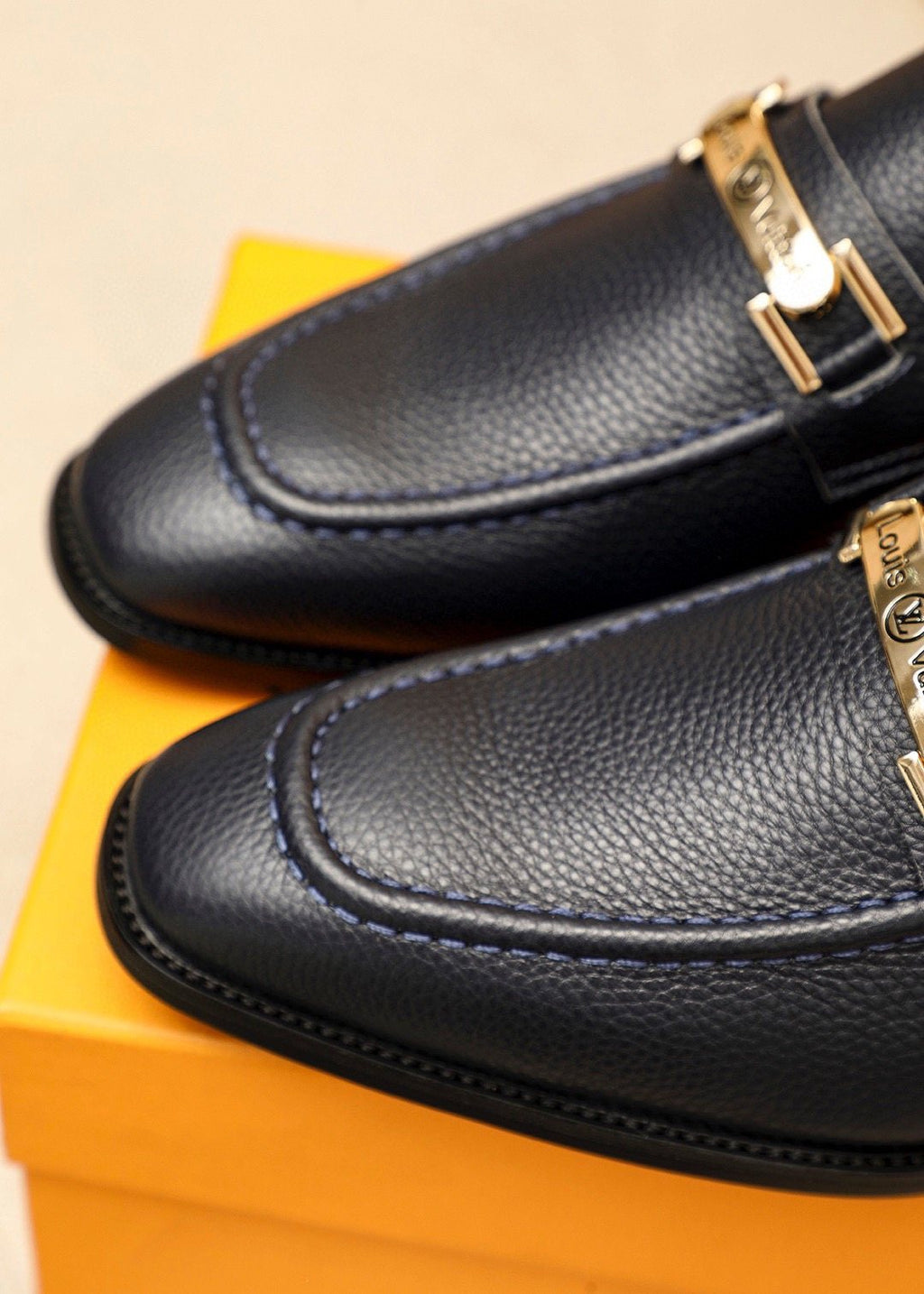 Louis Vuitton Black Pebbled Bar Loafers — detail