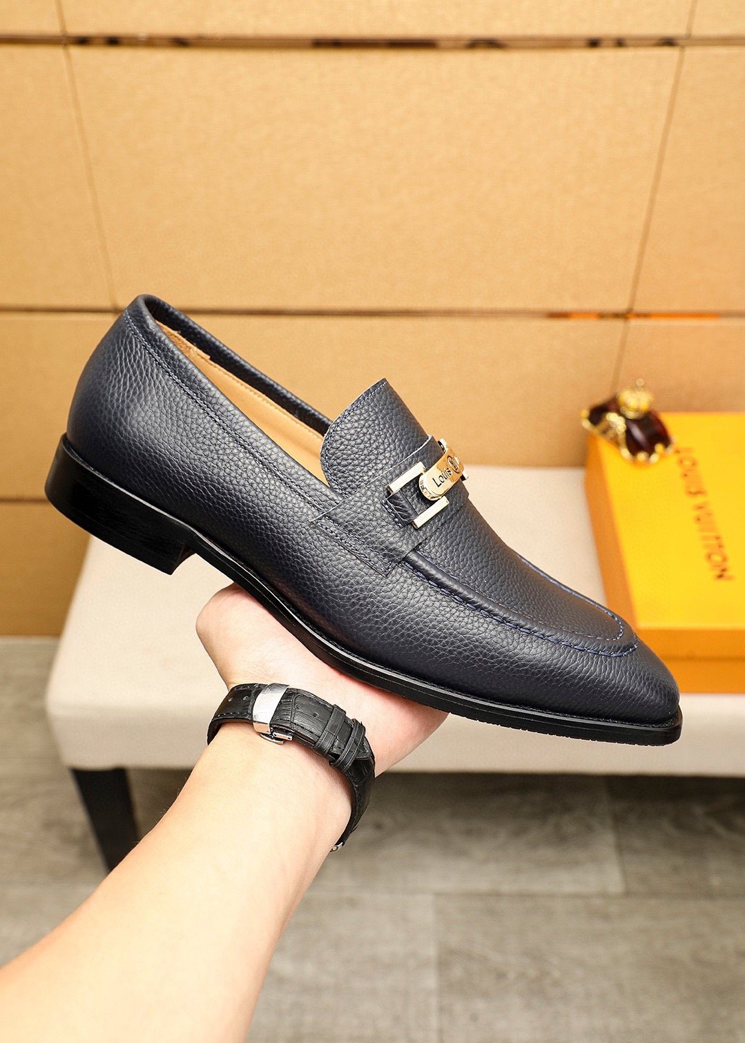 Louis Vuitton Black Pebbled Bar Loafers — model