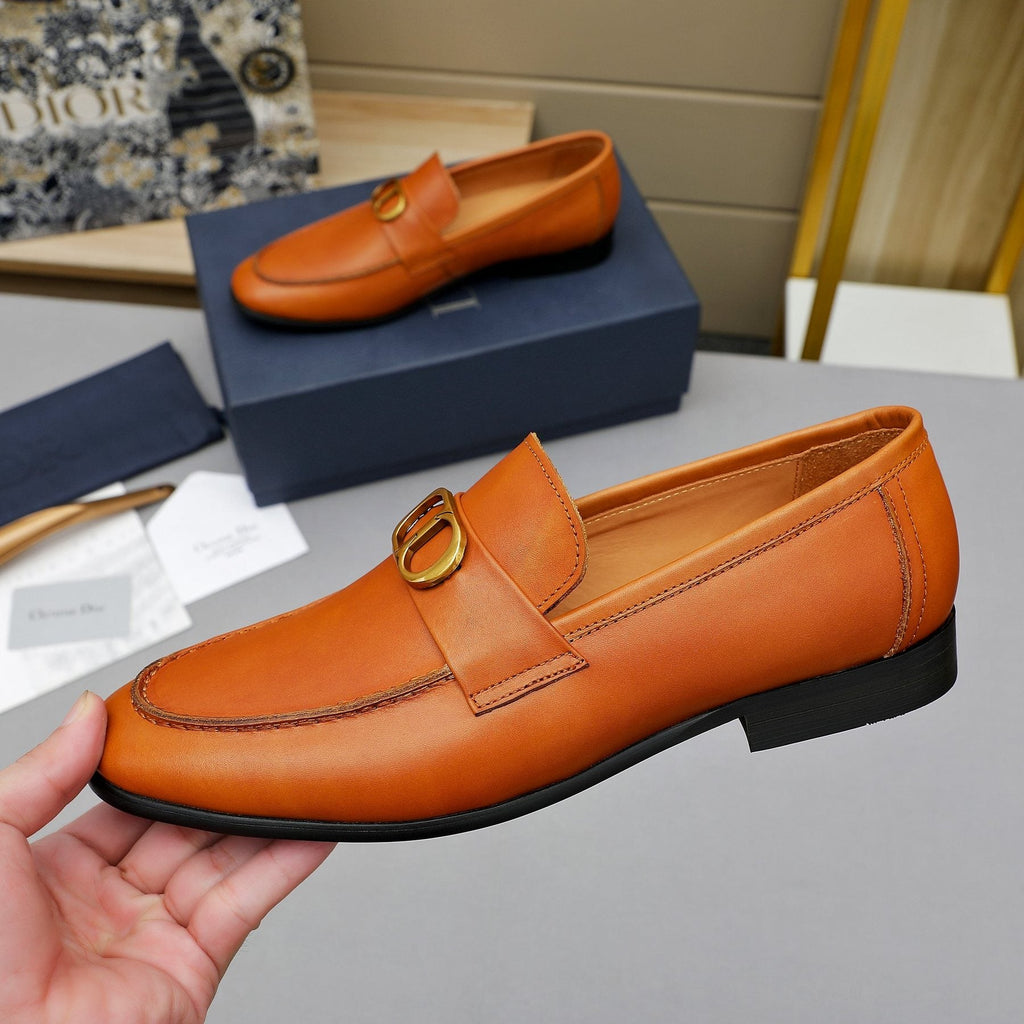 Dior Orange-Brown Buckle Loafers — model