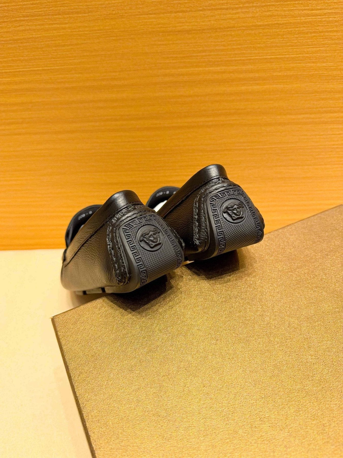 Versace Black Textured Hardware Loafers — back