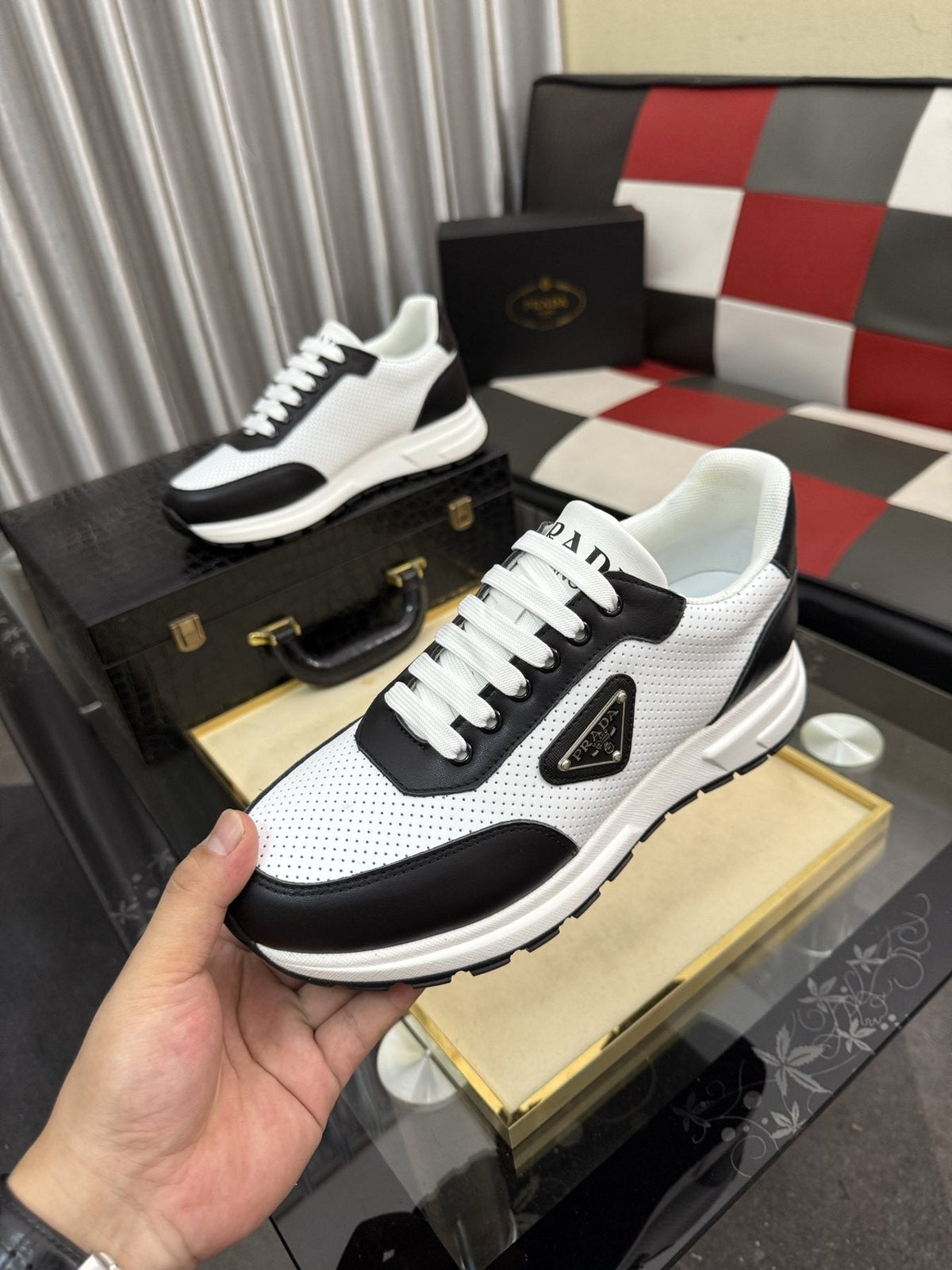 Prada White and Black Low-Top Sneakers — front