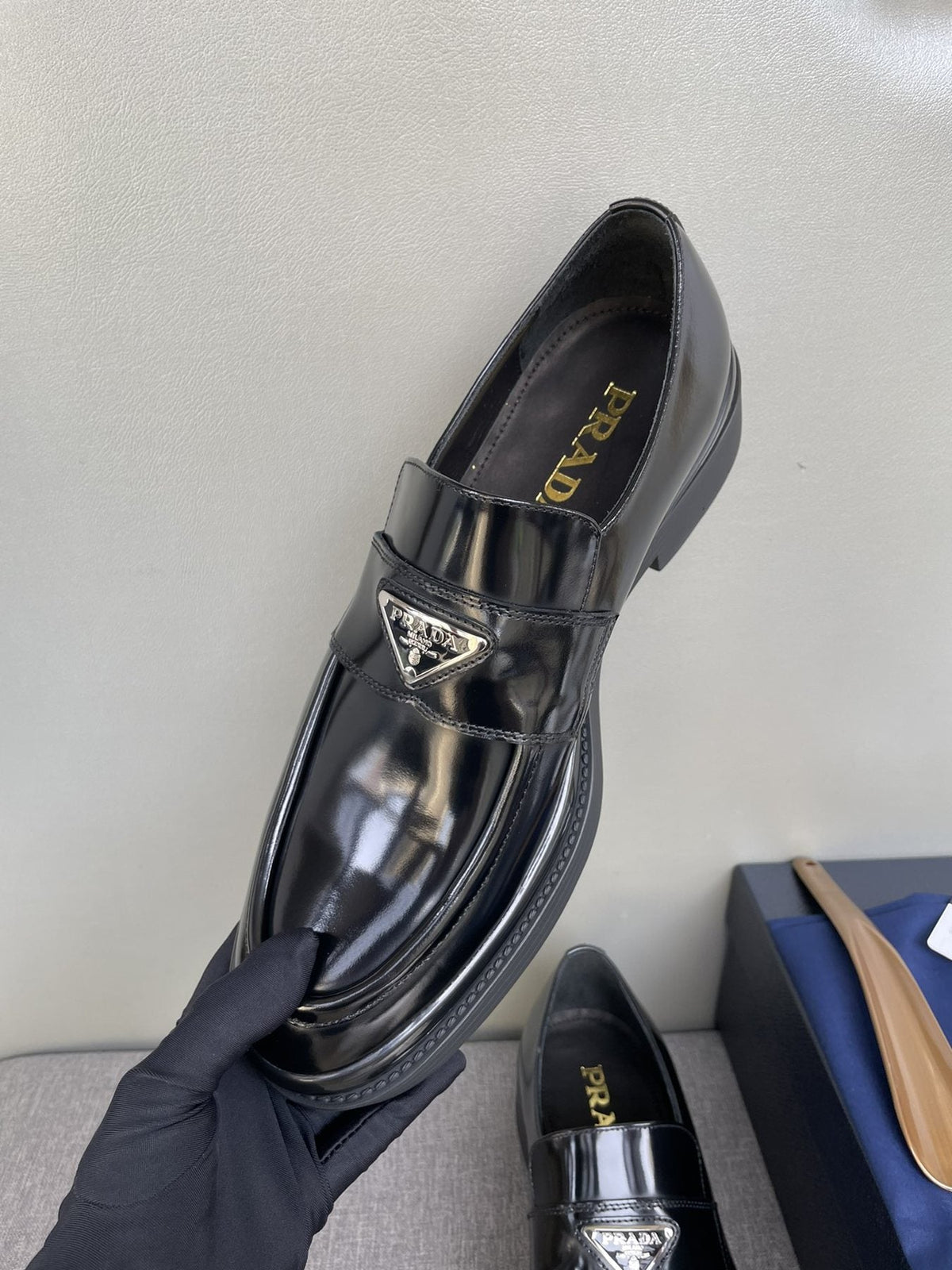 PRADA Black Glossy Plaque Loafers — label