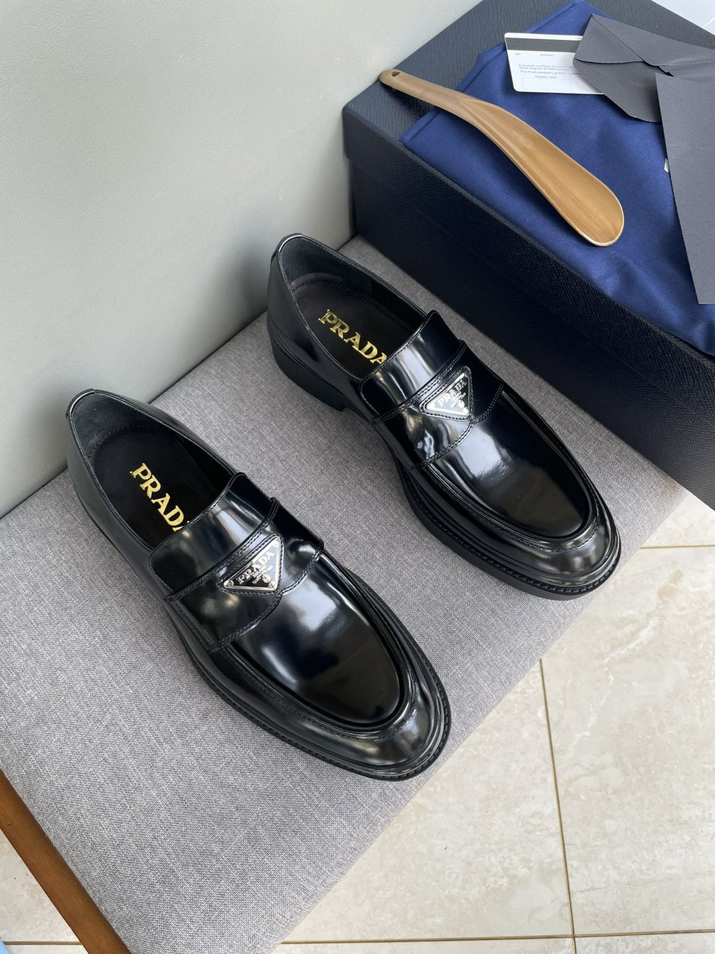 PRADA Black Glossy Plaque Loafers — front